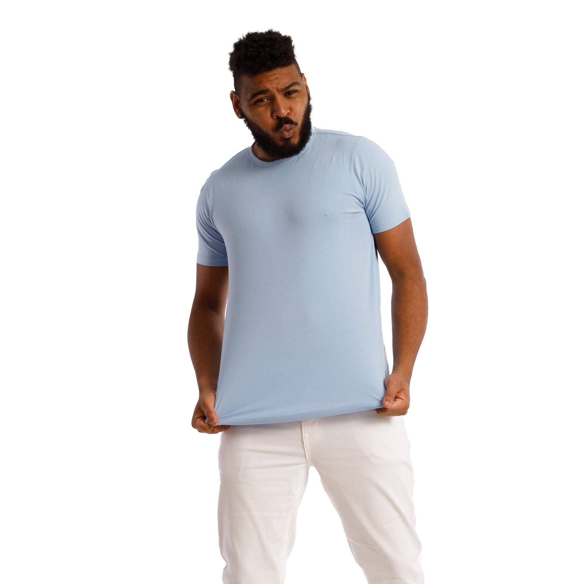 Man in white and blue crew neck t-shirt wearing blue and white